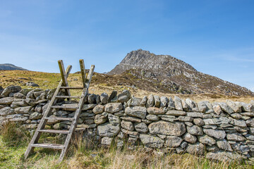 View of Tryfan 
Tryfan is a mountain in the Ogwen Valley, Snowdonia, Wales. It forms part of the Glyderau group, and is one of the most recognisable peaks in Britain, having a classic pointed shape.