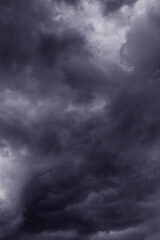 Epic Dramatic Storm sky with dark grey violet cumulus rainy clouds background texture, thunderstorm	

