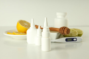 Flu treatment accessories on white table, close up