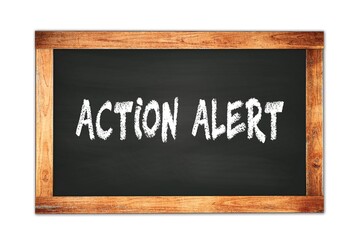 Fototapeta premium ACTION ALERT text written on wooden frame school blackboard.