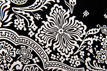 Seamless vintage abstract white floral pattern on black textiles fabric, retro background