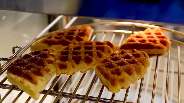 Crunchy wafel butter-flavoured biscuits are in the butter display case, tempting to eat, perfect for your video stock