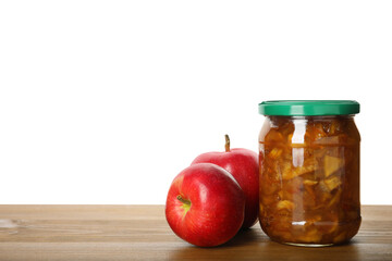 Tasty apple jam in glass jar and fresh fruits on wooden table against white background, space for text