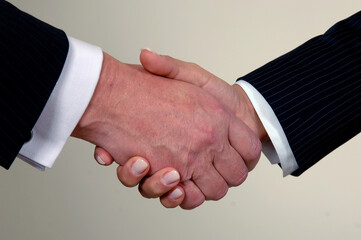 businessman's hand outstretched in greeting
