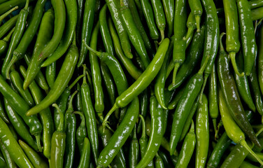 Several peppers are lying on the floor