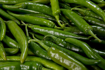 Several peppers are lying on the floor