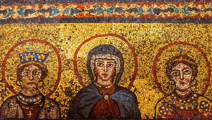 Close-up on religious mosaic portraiting Virgin Mary and other two catholic female saints