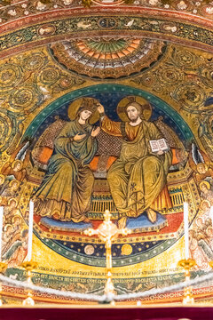 Close-up on religious mosaic portraiting Jesus Christ and Virgin Mary together in heaven