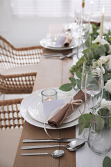 Festive table setting with beautiful tableware and decor indoors