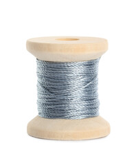 Wooden spool of silver sewing thread isolated on white
