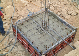 Concrete in a steel form poured concrete in the building construction area on the mountain