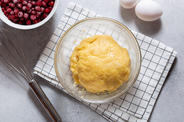 Step-by-step preparation of an open pie with red currant filling and sour cream on shortcrust pastry, step 2 - preparation of shortcrust pastry, top view, horizontal