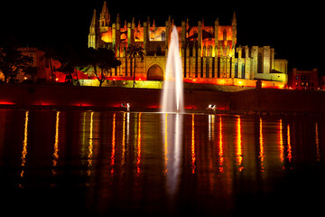 Cathedral and fountain illuminate in the night . Catedral de Mallorca gothic architecture . Palma Spain cathedral in the night   © Leilani