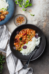 chicken stir fry with with tomato sauce, maple syrup and rice
