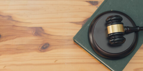 top view of judge gavel on wooden background and copy space.