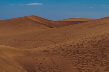 Fototapeta na wymiar Sand waves in dunes in Maspalomas in Canary Islands 