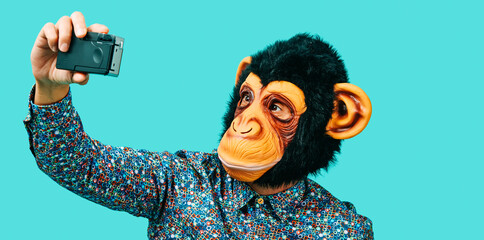 monkey man takes a selfie, web banner © nito