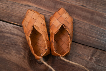 peasants' bast shoes made of birch bark toy small