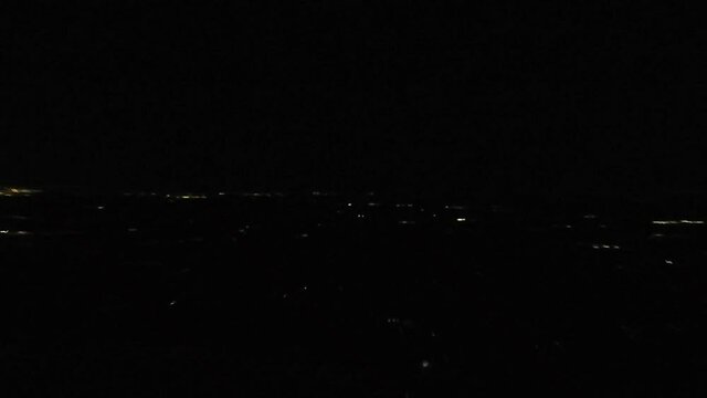 Superzoom Out Over City Skyline Aerial Airplane Night Shot Evening Clear Sky