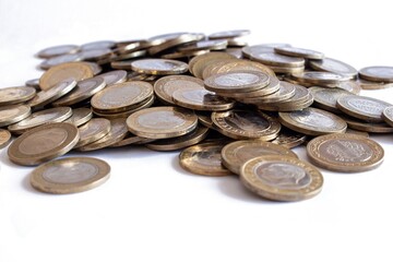 Stack of Turkish lira coins isolated on white background.