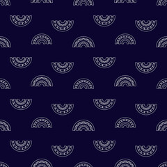 Seamless pattern with white linear rainbows on a blue background. Cute vector illustration in ethnic style for kids, girls and women. Doodle style image. The print is suitable for fabric, clothing