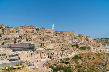 Obraz premium Panorama of Matera from San Pietro Caveoso viewpoint on Sasso Barisano and on the canyon carved by the Gravina River