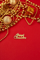 Golden christmas decorations on red background. Christmas New year or party banner