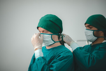 surgeon doctor team working in operation room at hospital, medical health clinic with specialist