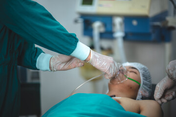 surgeon doctor team working in operation room at hospital, medical health clinic with specialist