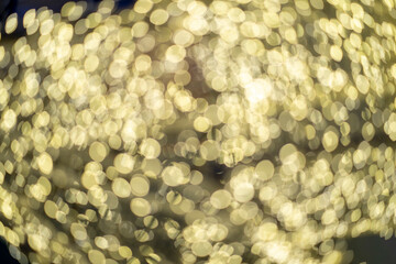 blurred lights bokeh falling texture. Colorful christmas or new year background. Holiday night party celebration decoration. Glittering lights on black background. Blurred colorful christmas 