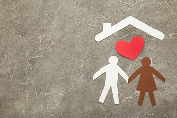 Unity concept, multiracial paper people on pink background. No racism