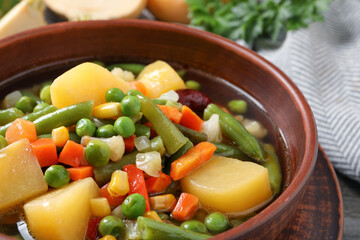 Bowl of delicious turnip soup, closeup view
