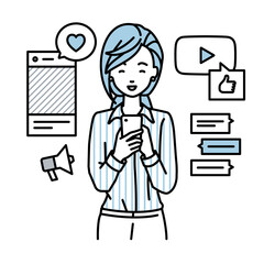 立ってスマートフォンでさまざまなSNSで楽しく交流するブラウスの女性