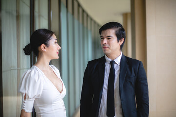 professional business partner person talking together, man and woman working in urban city