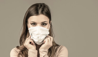 Girl Wearing Protective Mask. Woman wearing surgical mask for corona virus. Woman wearing an anti virus protection mask. Woman wearing medical face mask