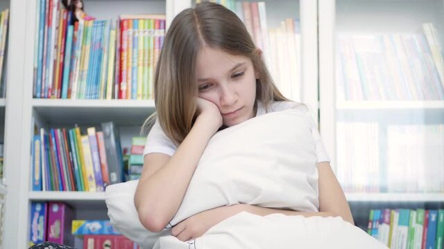 Sad Child, Unhappy Kid, Sick Ill Teenager Girl in Depression, Stressed Thoughtful Bullied Person Affected by Coronavirus Pandemic