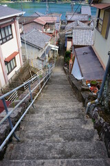 Stairs and Aerial view of Fisherman's village, Traditional Japanese town of Sugari-cho, in Mie, Japan - 三重県 尾鷲市 須賀利町の街並み © Eric Akashi