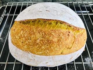 close up of sourdough traditional Frence bread with  curcuma powder for yellow color.