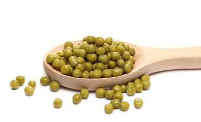 Cooked peas pile in wooden spoon isolated on white 