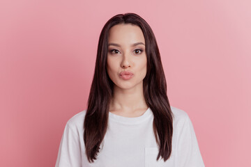 Photo of young attractive woman pouted lips send air kiss fillers beauty isolated over pink color background