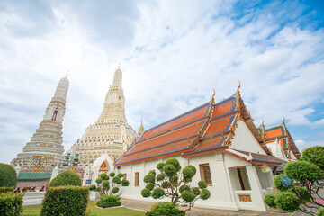 Fototapeta premium Wat Arun and Phra Prang along the Chao Phraya River Destinations and symbols of Bangkok and Siam