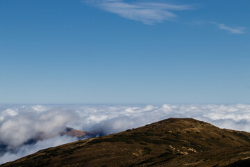 Fototapeta na wymiar clouds and fog in the mountains