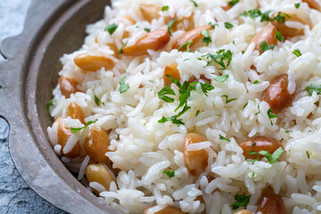 Traditional delicious Turkish food; Almond rice pilaf (Turkish name; Bademli pirinc pilavi)
