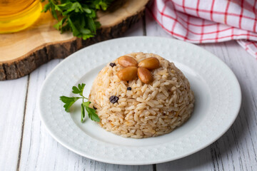 Traditional delicious Turkish food; Almond rice pilaf (Turkish name; Bademli pirinc pilavi)