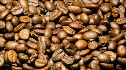Coffee beans freshly roasted. Selective focus