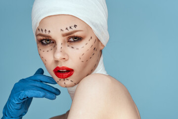 a person Red lips plastic surgery operation bare shoulders blue background
