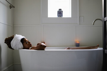 Woman taking relaxing bath