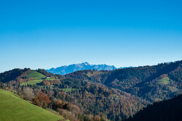 Fototapeta na wymiar Panoramic view from the top of Hoernli in Cantone Zurich on a sunny autumn afternoon