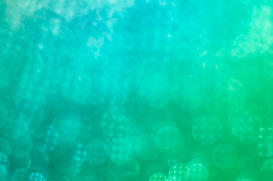 Blurred background with round bokeh. Gradient bright bokeh in pattern. Bright ligts. Abstract blurred background. Two colors walpaper. Walpeper