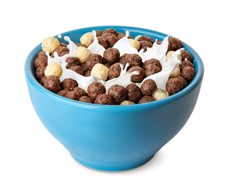 breakfast cereal with splashing milk isolated on white